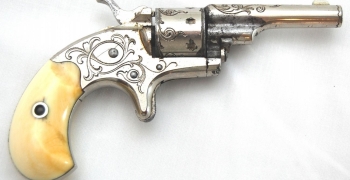 Colt Old Line open-top 7 shot revolver in 22 caliber, Factory Engraved w/ Ivory Grips